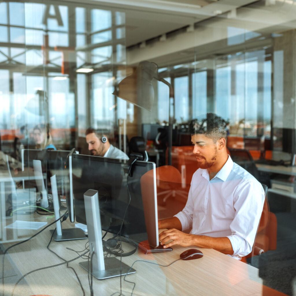 man looking at monitor